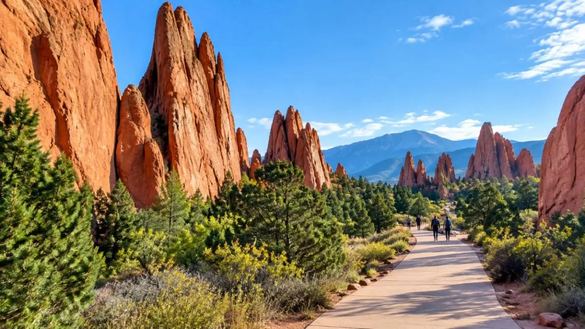 Tall red sandstone fins beside the paved trail through the Central Garden