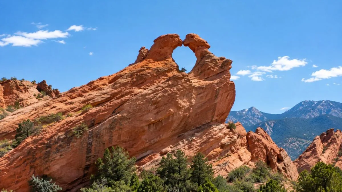 The Kissing Camels formation on top of a long red sandstone ridge