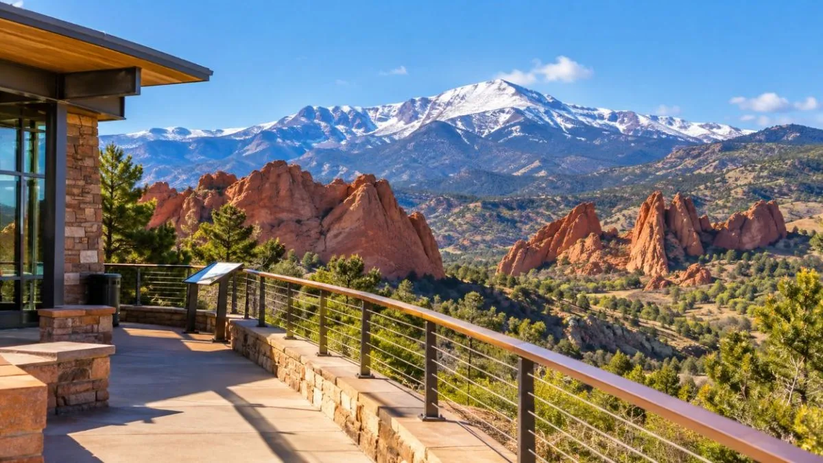 A visitor center terrace looking out at the red rocks and Pikes Peak
